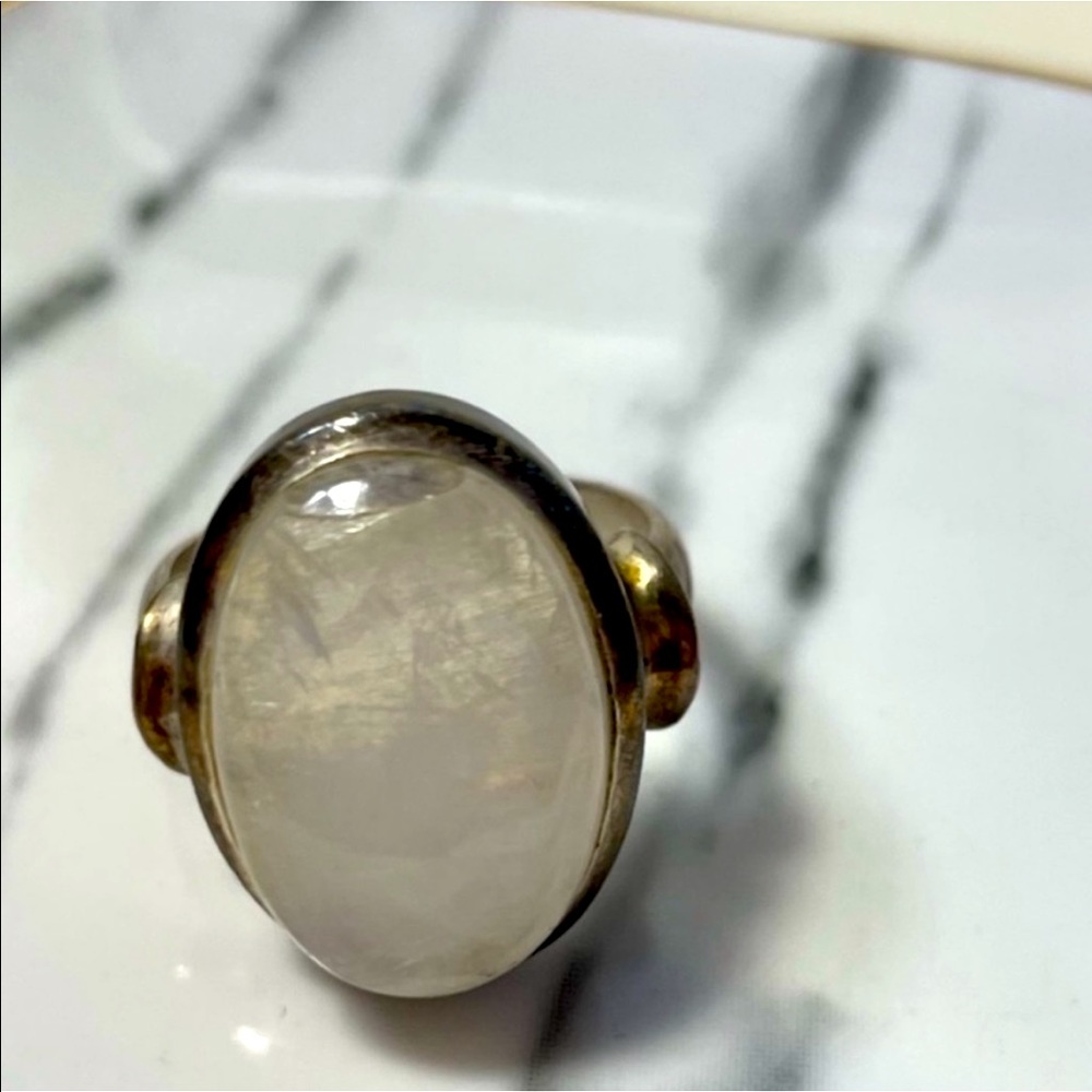 Authentic, rare real Moonstone, placed into a
sterling silver ring. Size 9-10W